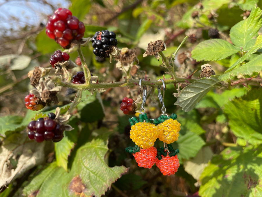 Double beaded salmonberry earrings- black light reactive!