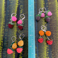 Double beaded salmonberry earrings- black light reactive!